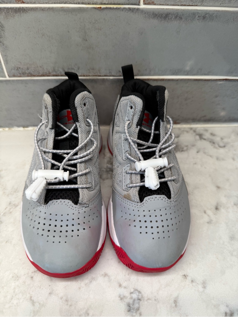 Under Armour Grey and Red Kids Athletic Sneakers
